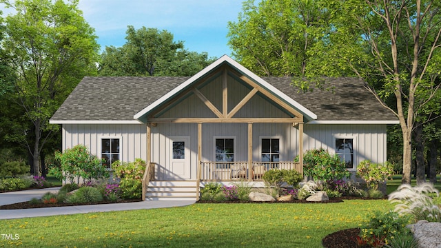 3188 Williams Ln, Graham, NC 27253 - modern farmhouse with a porch, roof with shingles, and a front lawn