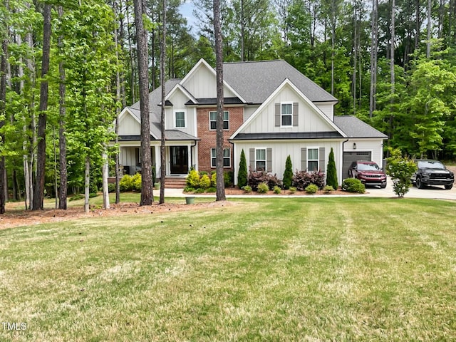 1218 Rogers Farm Rd, Wake Forest, NC 27587 - view of front of house with board and batten siding, an attached garage, concrete driveway, a front lawn, and roof with shingles