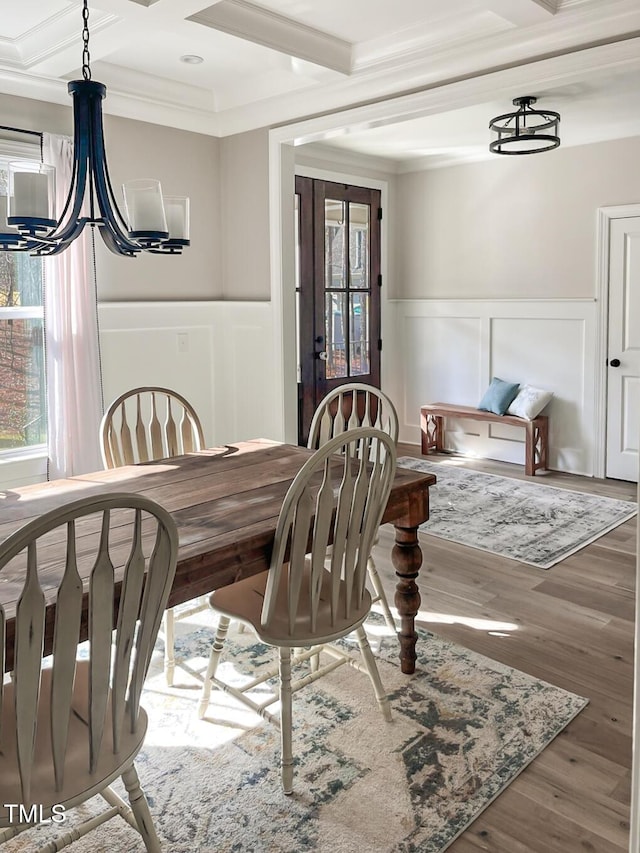 1218 Rogers Farm Rd, Wake Forest, NC 27587 - dining area featuring a decorative wall, ornamental molding, a chandelier, coffered ceiling, and beamed ceiling