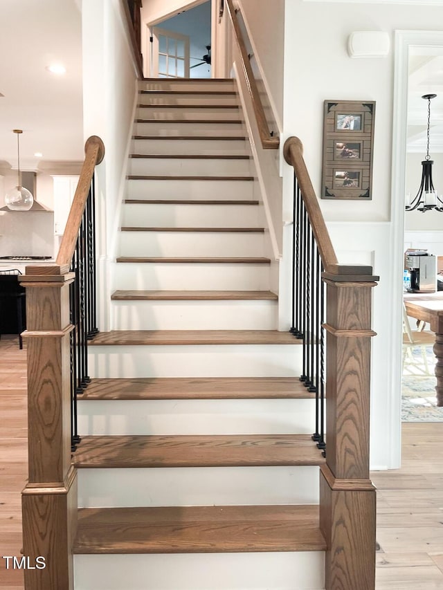 1218 Rogers Farm Rd, Wake Forest, NC 27587 - stairs with wood finished floors, a chandelier, and recessed lighting