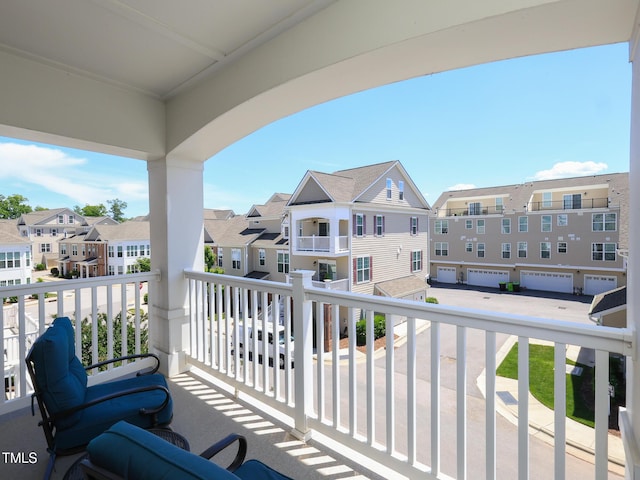 balcony featuring a residential view
