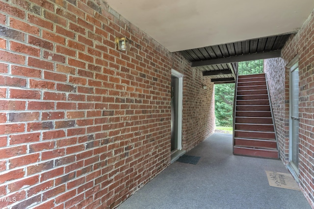 view of patio / terrace featuring stairway