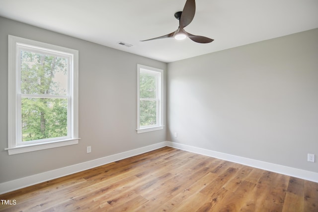 509 Olive Branch Rd, Durham, NC 27703 - spare room with ceiling fan, baseboards, and light wood-type flooring