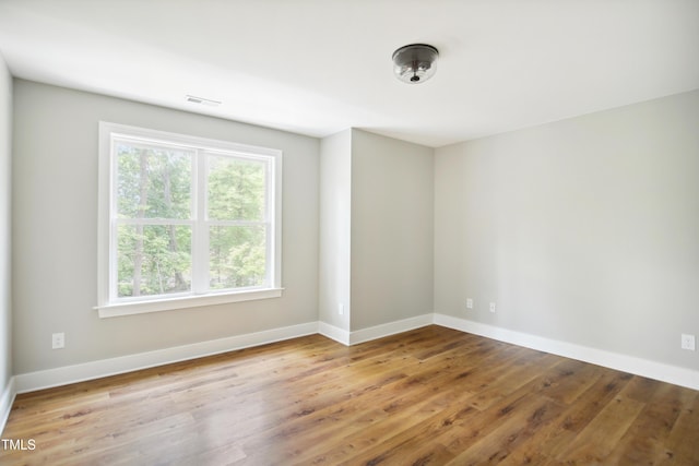 509 Olive Branch Rd, Durham, NC 27703 - spare room with wood finished floors and baseboards