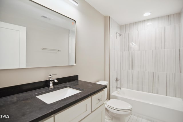 509 Olive Branch Rd, Durham, NC 27703 - full bathroom featuring toilet, vanity, and shower / bathtub combination
