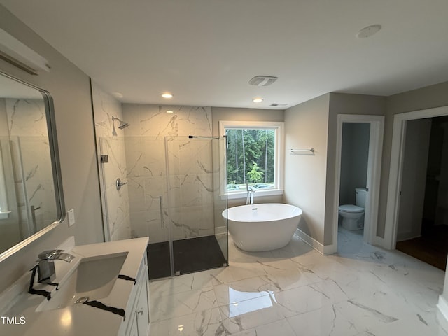 509 Olive Branch Rd, Durham, NC 27703 - bathroom with vanity, toilet, a soaking tub, a marble finish shower, and marble finish flooring