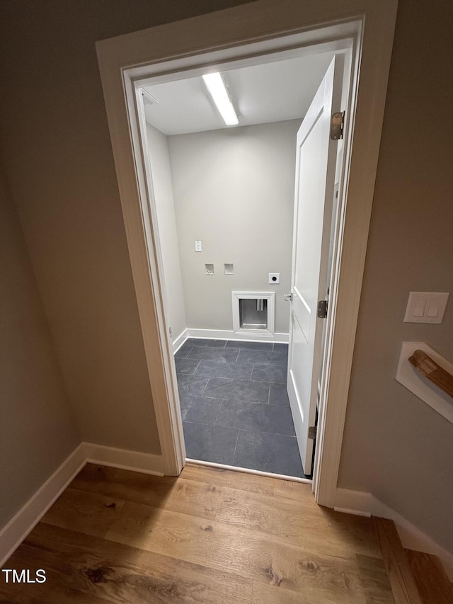 509 Olive Branch Rd, Durham, NC 27703 - laundry area with electric dryer hookup, baseboards, wood finished floors, and washer hookup