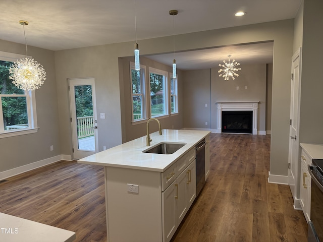 509 Olive Branch Rd, Durham, NC 27703 - kitchen featuring a sink, stainless steel dishwasher, a chandelier, open floor plan, and recessed lighting