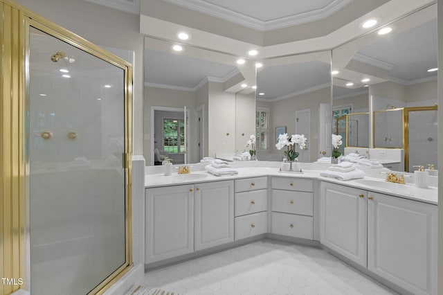 bathroom with a stall shower, ornamental molding, recessed lighting, double vanity, and tile patterned floors