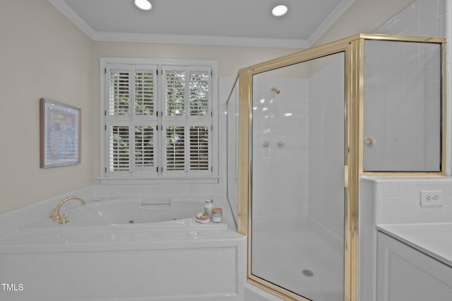 full bathroom with a whirlpool tub, a stall shower, crown molding, and vanity