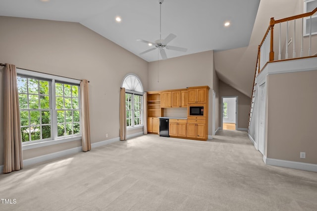 unfurnished living room featuring high vaulted ceiling, baseboards, light colored carpet, a ceiling fan, and recessed lighting
