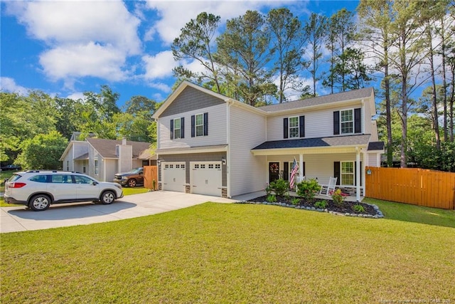 traditional home featuring a porch, fence, concrete driveway, a garage, and a front lawn