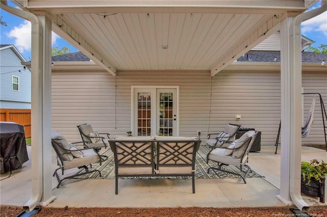view of patio / terrace featuring fence and an outdoor hangout area