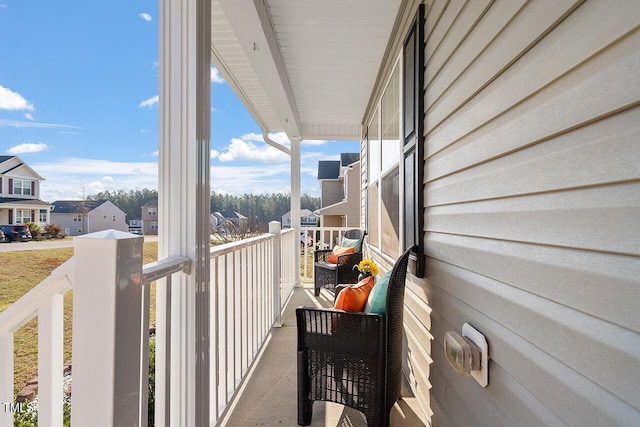 balcony featuring a residential view