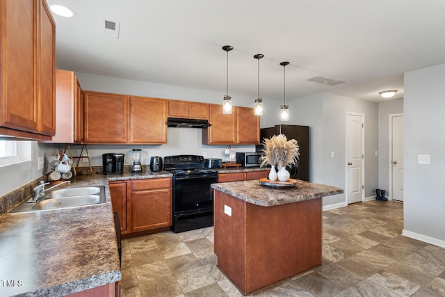 kitchen featuring black / electric stove, a sink, stainless steel microwave, under cabinet range hood, and fridge
