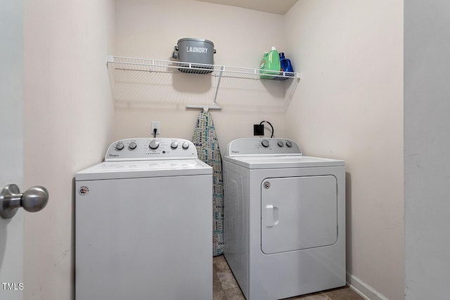 laundry area with washer and dryer