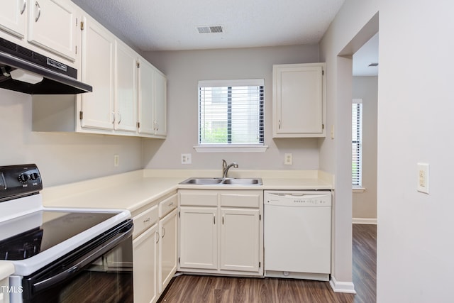 600 Audubon Lake Dr Unit 6B13, Durham, NC 27713 - kitchen featuring dishwasher, electric range, a sink, under cabinet range hood, and dark wood-style flooring