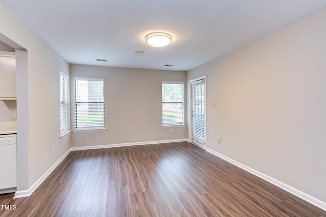 600 Audubon Lake Dr Unit 6B13, Durham, NC 27713 - spare room featuring dark wood-type flooring and baseboards