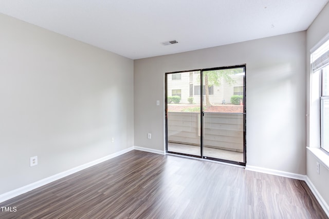 600 Audubon Lake Dr Unit 6B13, Durham, NC 27713 - empty room featuring dark wood-style flooring and baseboards
