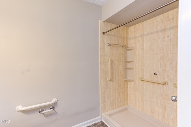 600 Audubon Lake Dr Unit 6B13, Durham, NC 27713 - bathroom featuring tiled shower and baseboards