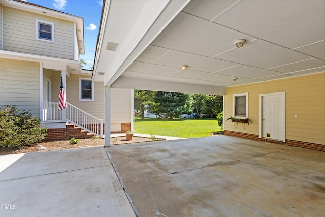 207 N Hopkins Ave, Spring Hope, NC 27882 - view of patio / terrace featuring an attached carport