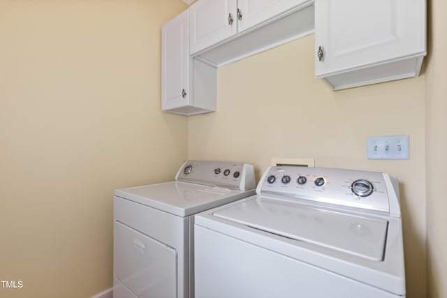207 N Hopkins Ave, Spring Hope, NC 27882 - washroom featuring cabinet space and washer and dryer