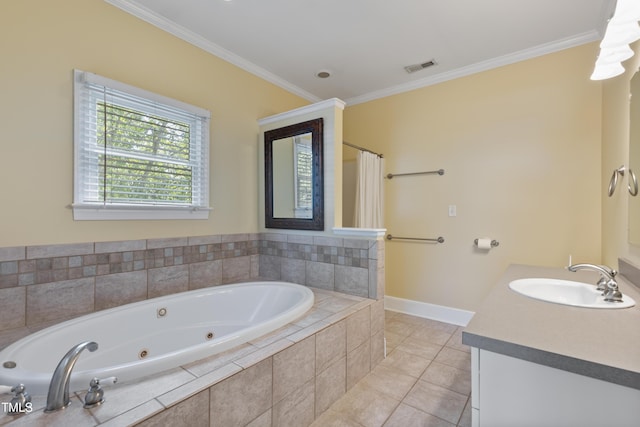 207 N Hopkins Ave, Spring Hope, NC 27882 - bathroom featuring ornamental molding, a whirlpool tub, baseboards, vanity, and tile patterned floors