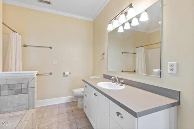 207 N Hopkins Ave, Spring Hope, NC 27882 - full bath featuring ornamental molding, toilet, baseboards, a shower with shower curtain, and vanity