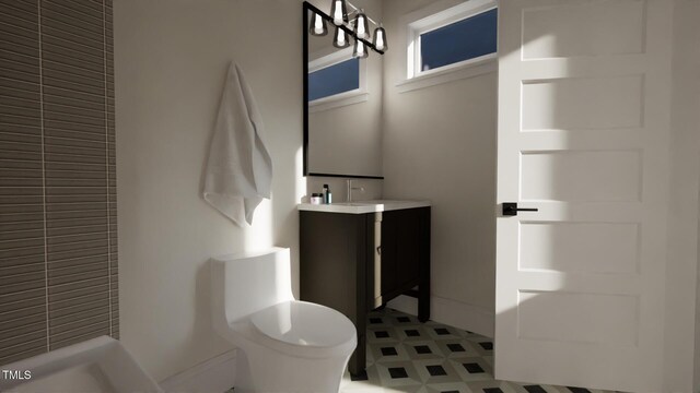 full bathroom featuring tile patterned floors, vanity, toilet, baseboards, and a shower