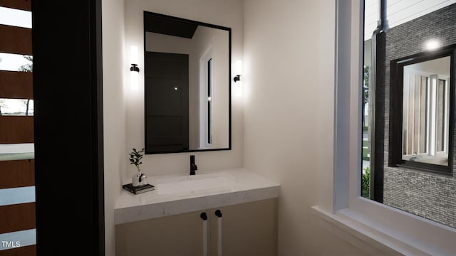 bathroom featuring healthy amount of natural light and vanity