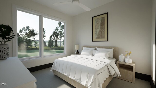 bedroom featuring ceiling fan and baseboards