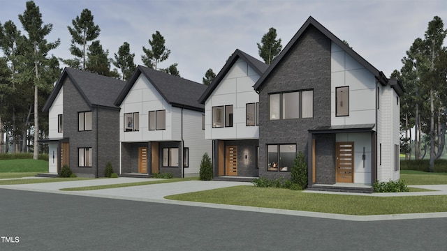 view of front of property featuring stone siding and a front yard