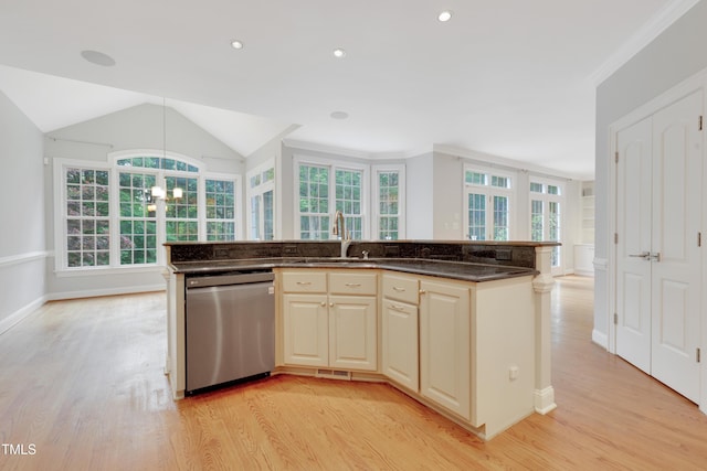 kitchen with stainless steel dishwasher, light wood finished floors, a sink, a chandelier, and a center island with sink