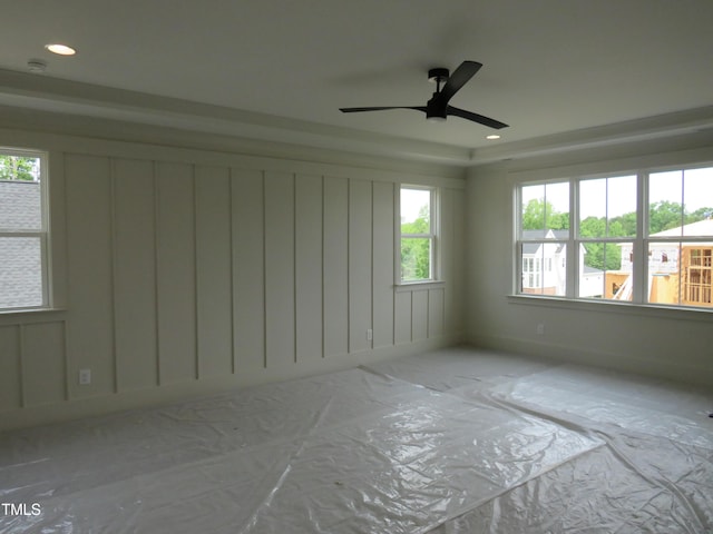 unfurnished room with healthy amount of natural light, recessed lighting, and a ceiling fan