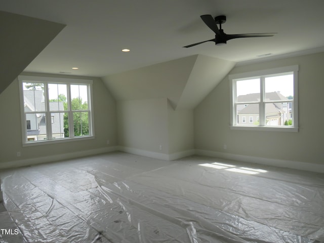 bonus room with baseboards, vaulted ceiling, ceiling fan, and recessed lighting