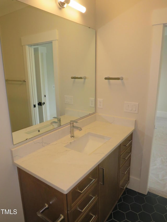 bathroom featuring vanity and tile patterned floors