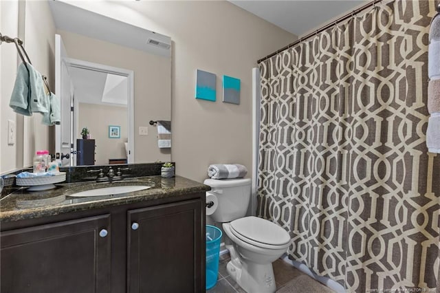 full bath with toilet, vanity, tile patterned flooring, and a shower with shower curtain