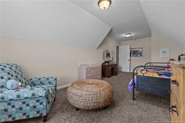 carpeted bedroom with lofted ceiling and baseboards