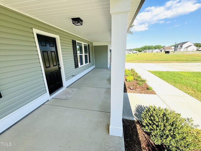 121 Earnest Way, Kenly, NC 27542 - view of patio / terrace featuring covered porch