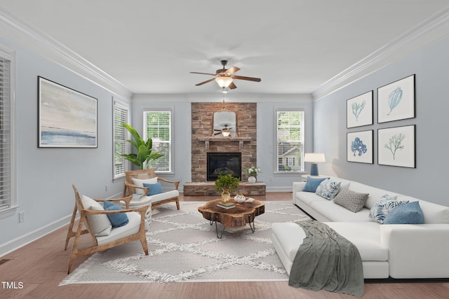 6509 Duncans Creek Ct, Fuquay Varina, NC 27526 - living area featuring ornamental molding, a ceiling fan, wood finished floors, and a fireplace