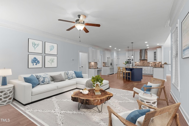 6509 Duncans Creek Ct, Fuquay Varina, NC 27526 - living room with crown molding, recessed lighting, ceiling fan, and light wood finished floors
