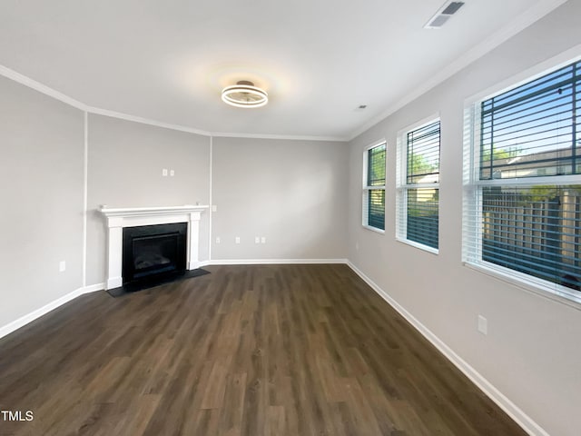 unfurnished living room featuring crown molding, visible vents, dark wood-style flooring, and baseboards