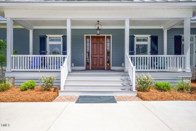 76 Soundside Dr, Oriental, NC 28571 - property entrance featuring a porch