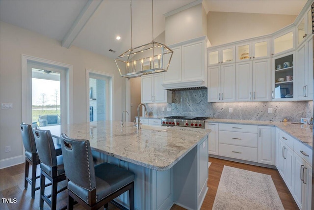 76 Soundside Dr, Oriental, NC 28571 - kitchen featuring a sink, dark wood-type flooring, decorative backsplash, and white cabinets