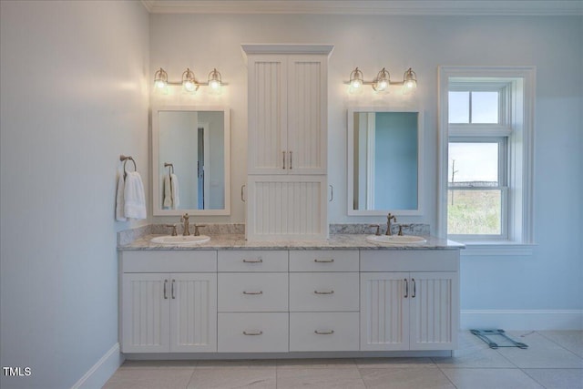 76 Soundside Dr, Oriental, NC 28571 - bathroom with baseboards, double vanity, healthy amount of natural light, and crown molding