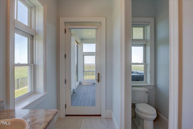 76 Soundside Dr, Oriental, NC 28571 - bathroom with toilet, vanity, and baseboards