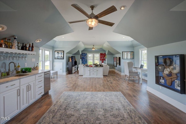 76 Soundside Dr, Oriental, NC 28571 - kitchen with a sink, ceiling fan, stainless steel dishwasher, white cabinetry, and lofted ceiling