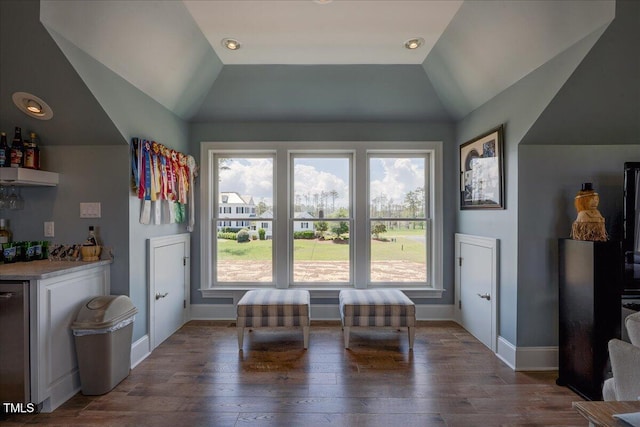 76 Soundside Dr, Oriental, NC 28571 - living area featuring a bar, vaulted ceiling, wood finished floors, and baseboards