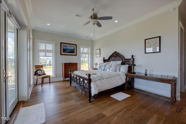 76 Soundside Dr, Oriental, NC 28571 - bedroom with wood finished floors, ornamental molding, recessed lighting, baseboards, and a ceiling fan