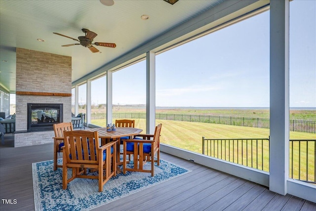 76 Soundside Dr, Oriental, NC 28571 - sunroom with a wooden deck, a rural view, and wood finished floors